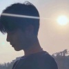 隔海望天明